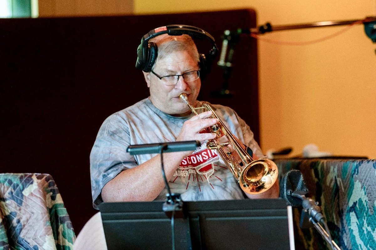 Scott Jensen playing trumpet in the studio